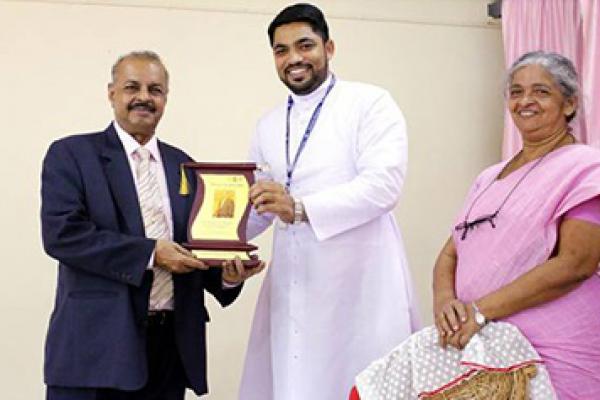 Dr.  Muhammed Majeed, Well Connected to His Roots Aids the Construction of a Seminar Hall Well Equipped with a Projector and Air-Conditioned for Caritas College of Pharmacy in Kottayam, Kerala
