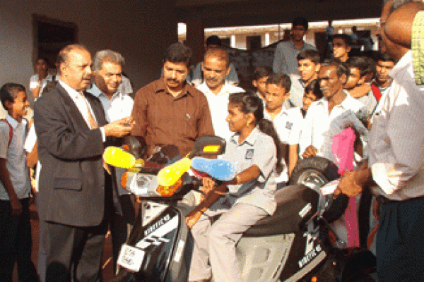 Dr. Majeed Presenting Sindhu A Scooter