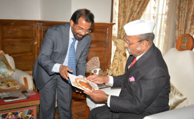 Mr VG Nair explaining the Curcumin brochure to Shri SD Patil, Honorable Governor of Sikkim (Oct 12, 2015)